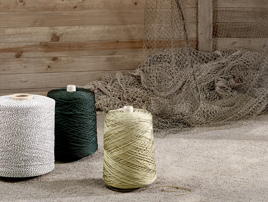 Yarn from old fishing nets, used carpets and industrial scraps